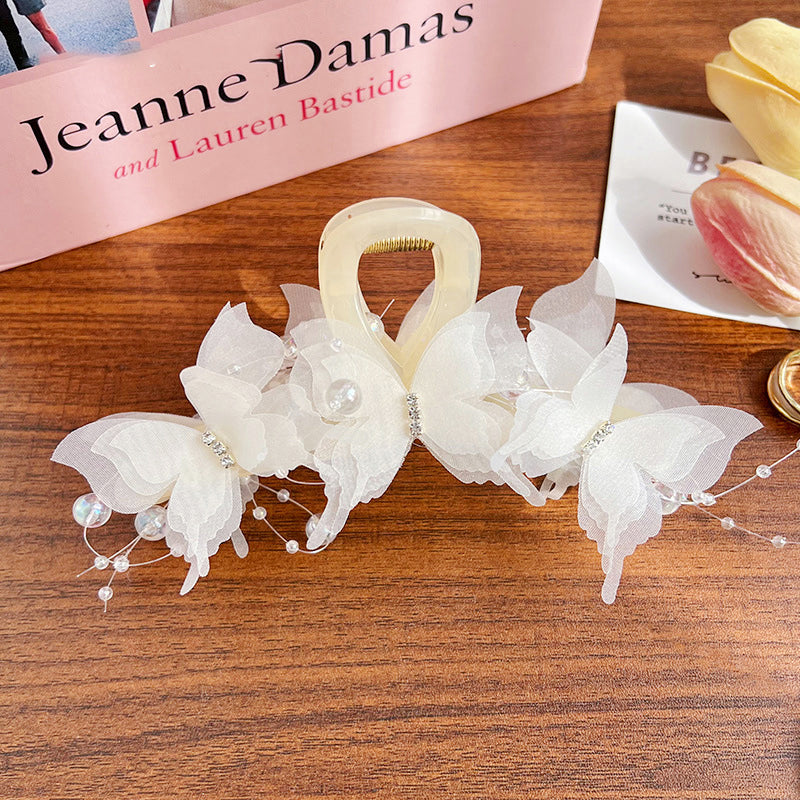 🔥Gorąca wyprzedaż 49% OFF🎁 Elegancki modny klips do włosów z kokardką