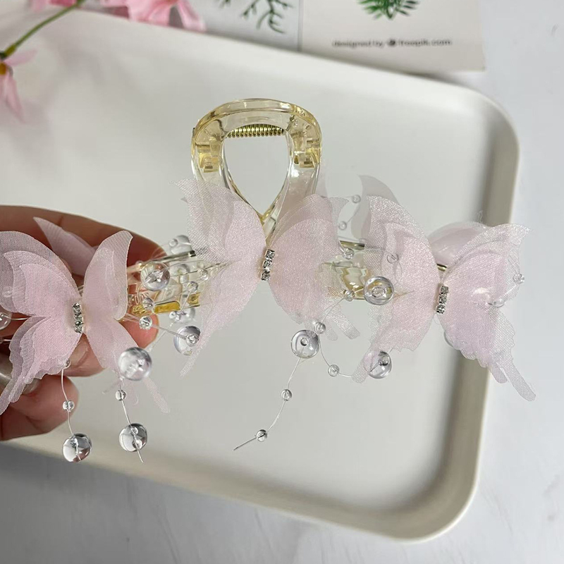 🔥Gorąca wyprzedaż 49% OFF🎁 Elegancki modny klips do włosów z kokardką