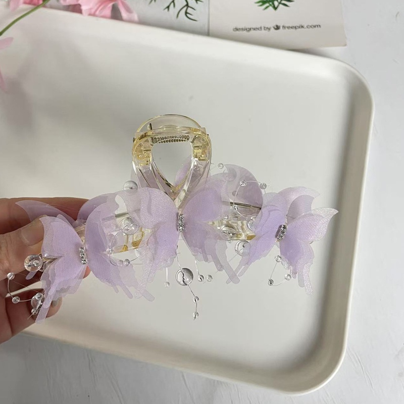 🔥Gorąca wyprzedaż 49% OFF🎁 Elegancki modny klips do włosów z kokardką