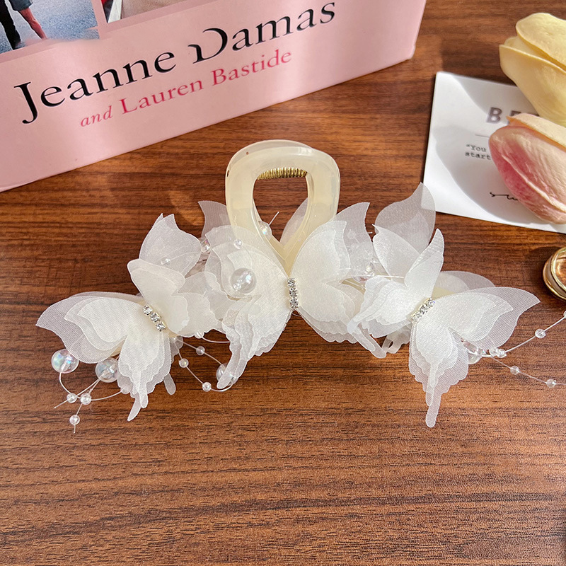 🔥Gorąca wyprzedaż 49% OFF🎁 Elegancki modny klips do włosów z kokardką