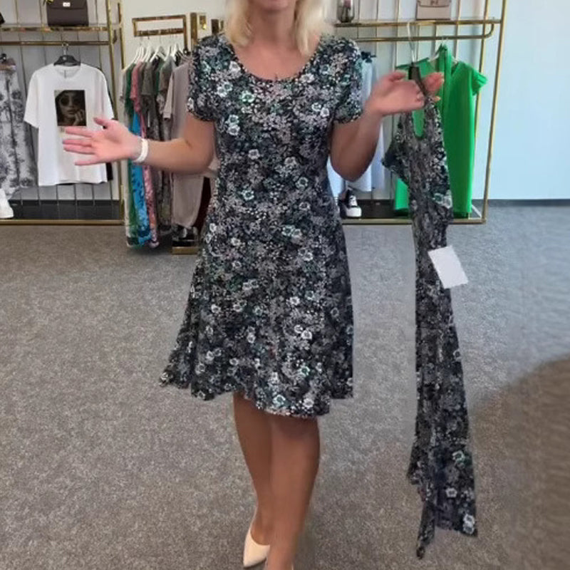 Damska sukienka z nadrukiem kwiatowym z dekoltem w szpic