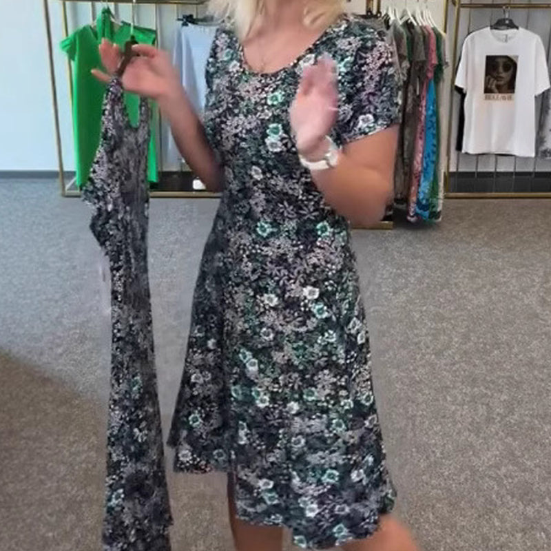 Damska sukienka z nadrukiem kwiatowym z dekoltem w szpic