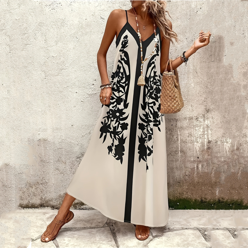 Długa, zwiewna sukienka maxi na cienkich ramiączkach