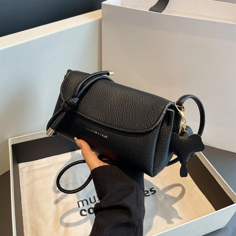 Prosta i wszechstronna mała kwadratowa torba